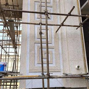 山南 黄金麻花岗岩别墅外墙干挂回纹造型效果