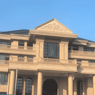 山南黄金麻别墅外墙干挂石材效果示例