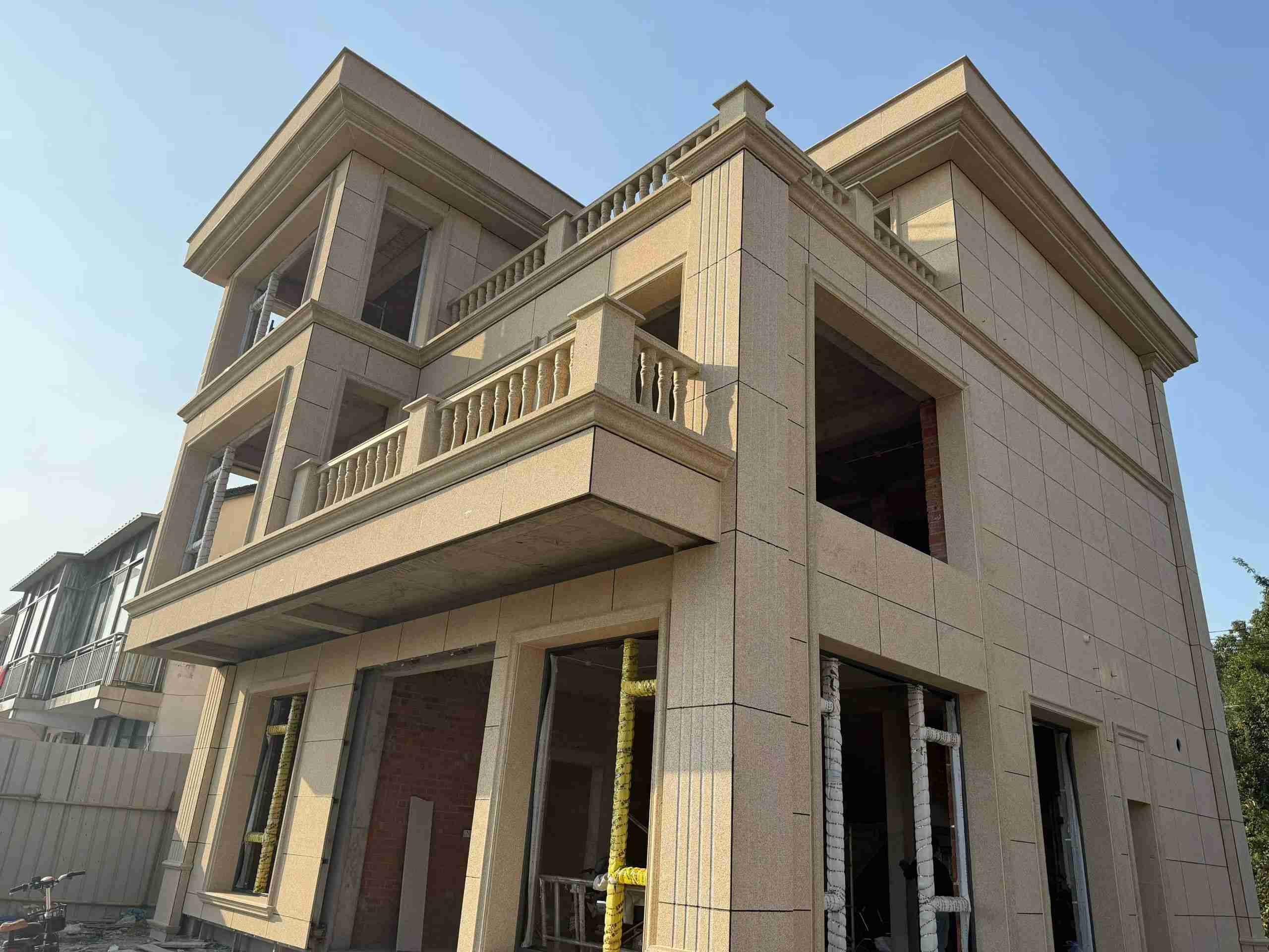 山南 黄金麻花岗岩石材荔枝面外墙干挂效果展示